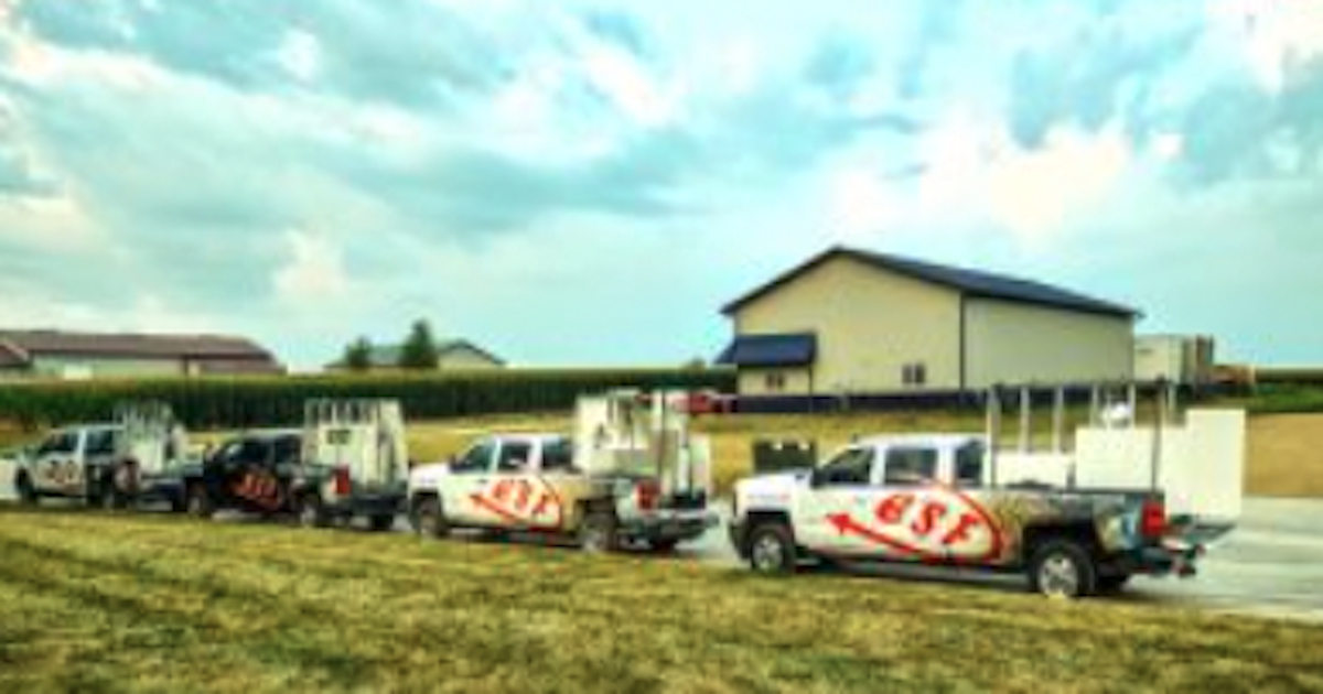 ESF Installation trucks with Natural Stone slabs on A-Frames getting ready for a countertop installation