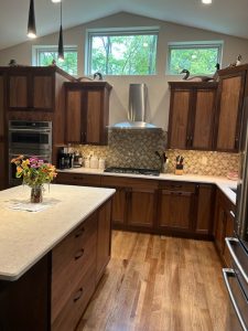Spacious kitchen makeover with kit island and stylich backsplash