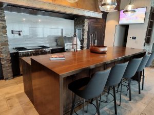 Beautiful wood island is the centerpiece of this kitchen